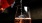 a glass of wine being poured