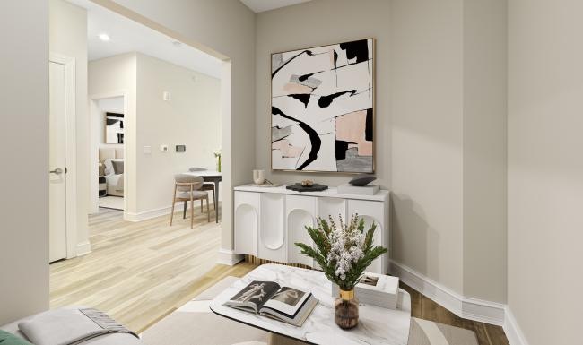 a room with a table and a painting on the wall