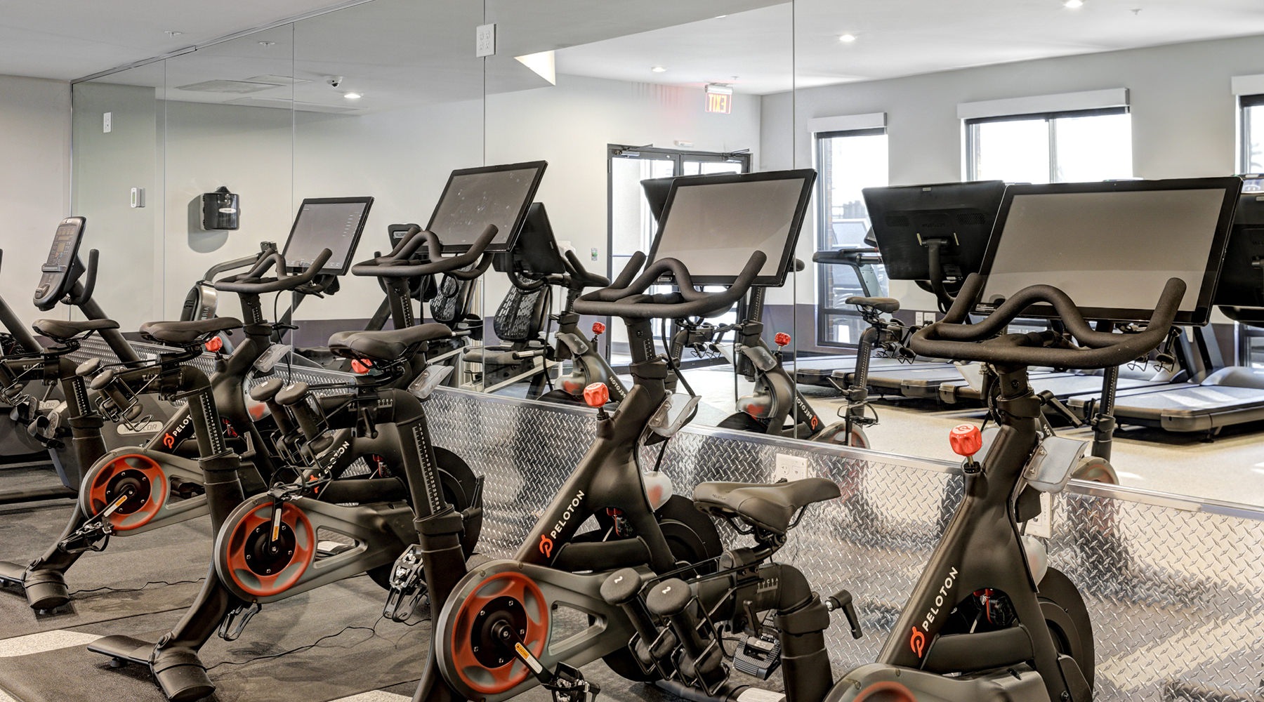 a room filled with spin bikes