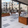 Grilling station and lush landscaping