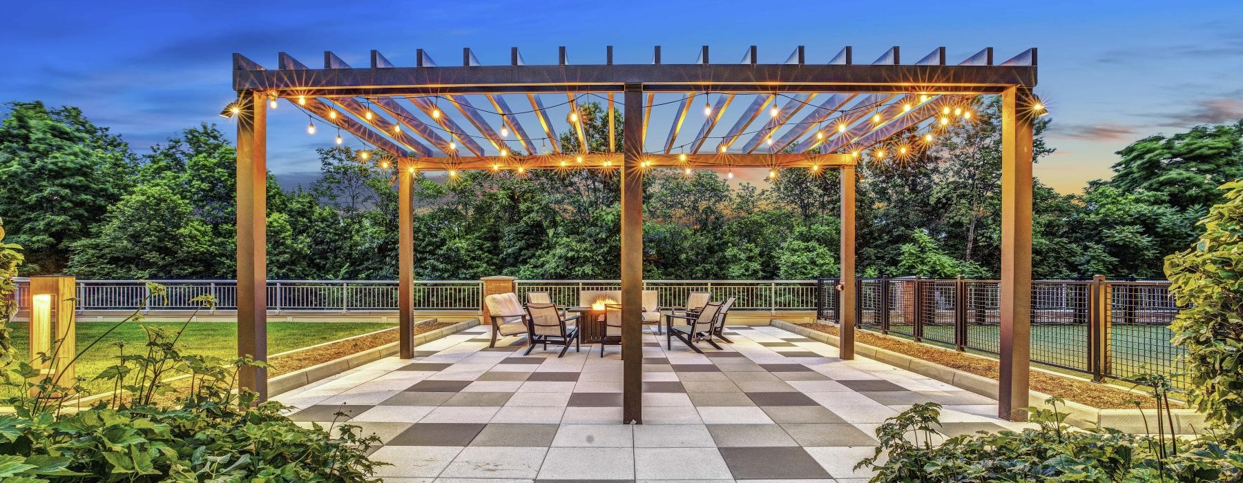 a wooden gazebo with a walkway