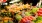 a market with vegetables and fruits