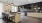 a kitchen with a table and chairs